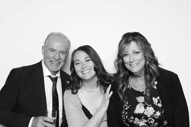 Guests posing for a polished black-and-white Glam Booth portrait, photo 23